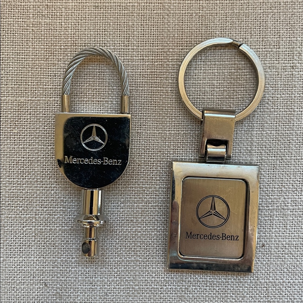 Two Mercedes-Benz Silver Metal Keychains